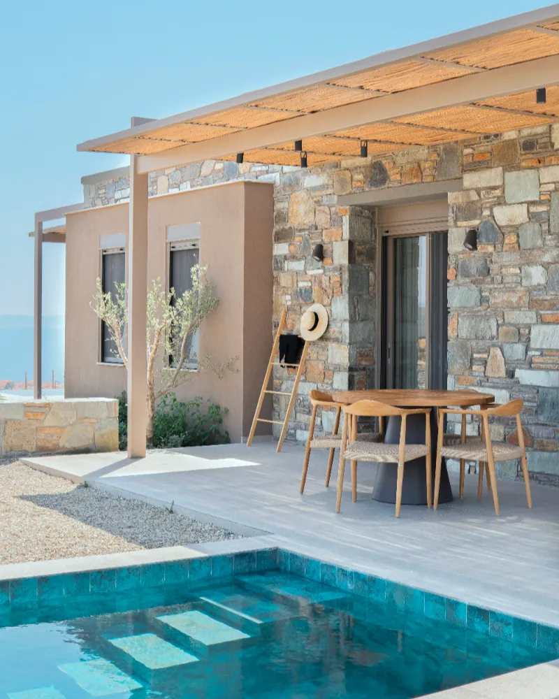 One Bedroom Suite terrace with heated pool overlooking Sithonia